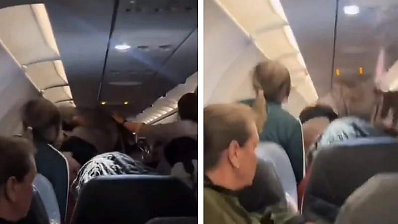 مشهد صادم لشاب يحاول خنق راكب على متن طائرة أمريكية.. فيديو
