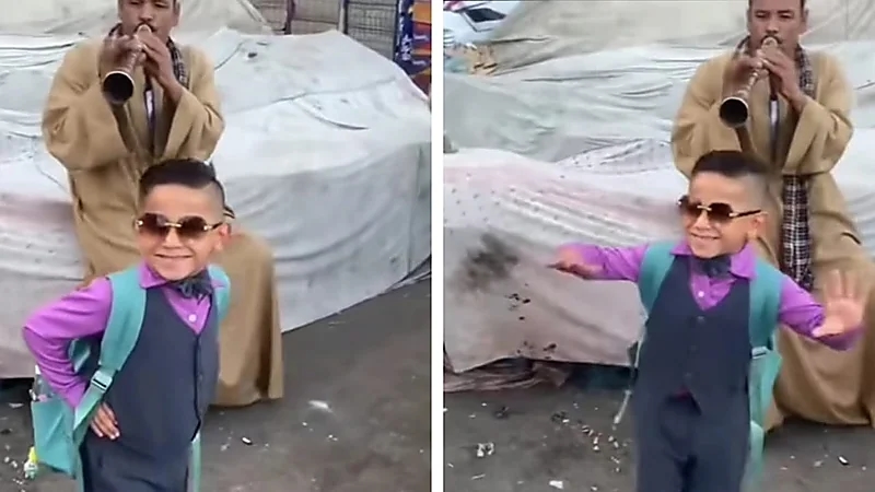 "بالطبل والمزمار" أسرة تصطحب طفلها إلى المدرسة .. فيديو