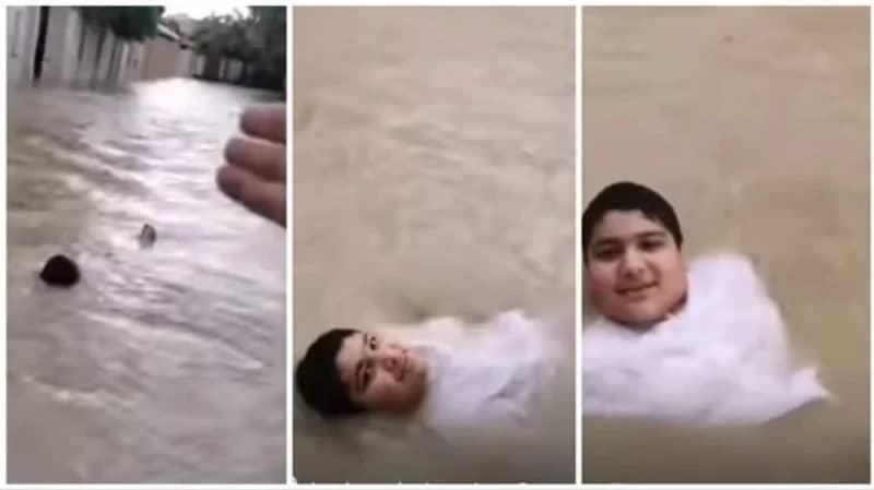 بالفيديو.. طفل يسبح على ظهره في سيول الإمارات