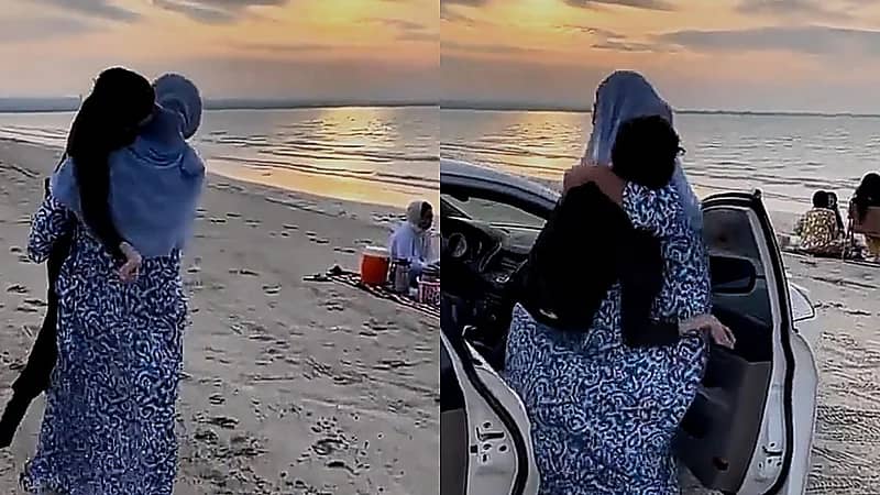 أم تحمل ابنها المصاب بالإعاقة للتنزه على البحر .. فيديو