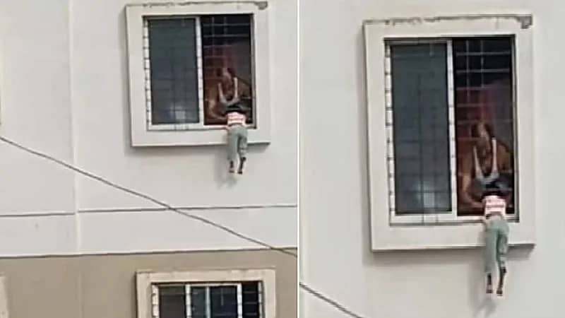 طفلة تتشبث بنافذة شقتها وتثير الرعب في قلوب الجيران.. فيديو