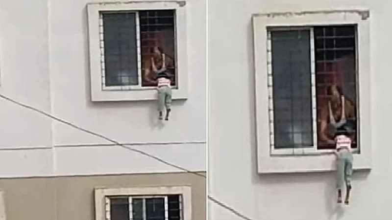 طفلة تتشبث بنافذة شقتها وتثير الرعب في قلوب الجيران.. فيديو