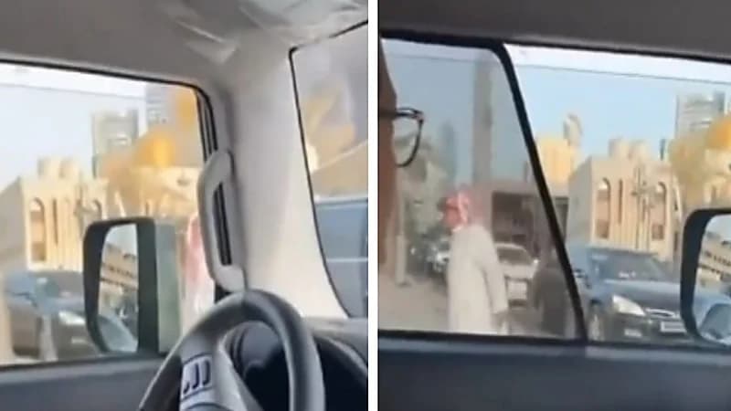 شاهد.. مواطن ينظم حركة السير في سوق المباركية بعد تزاحم السيارات بسبب الحريق الهائل 