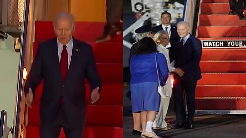 راقب خطواتك تكتب بالبنط العريض على سلم طائرة بايدن ليحقق معجرة .. فيديو