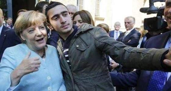 بعد التقاطه سيلفي مع المستشارة الالمانية ميركل ..شاب سوري يقاضي فيسبوك