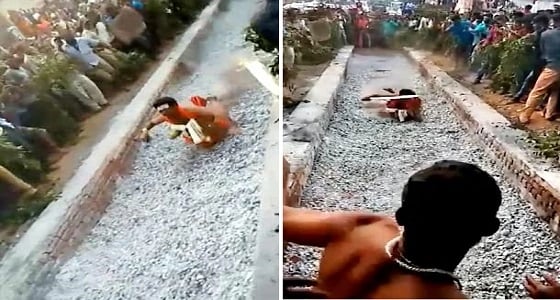 بالفيديو.. سقوط مروع لكاهن بجمر مشتعل