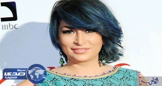 ديما بياعة ترسم وشماً لحمايتها من الحسد