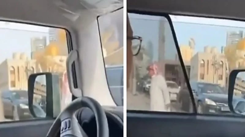 شاهد.. مواطن ينظم حركة السير في سوق المباركية بعد تزاحم السيارات بسبب الحريق الهائل 