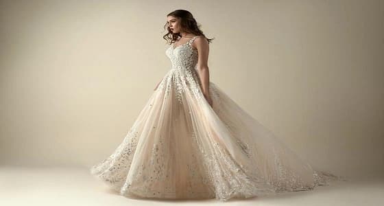 بالصور.. أحدث صيحات الموضة مع فساتين زفاف 2018