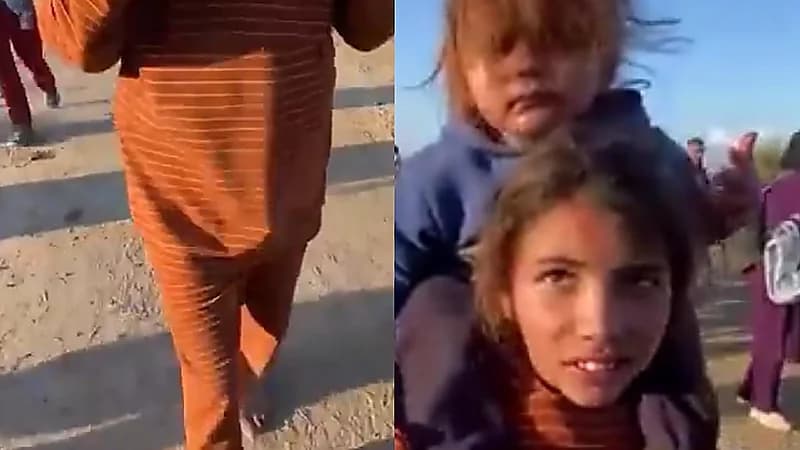 طفلة فلسطينية تحمل شقيقتها على كتفيها بأقدام حافية خلال عودتها لشمال غزة .. فيديو