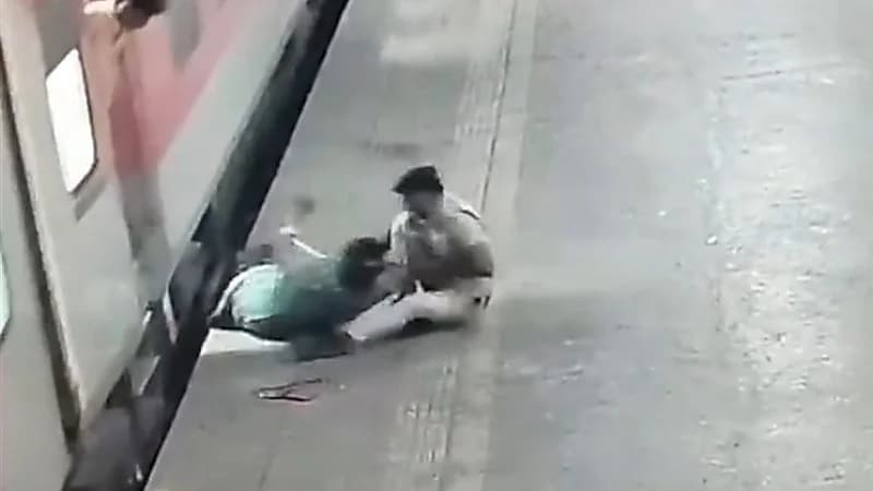 شجاعة شرطي تنقذ امرأة جرها قطار ... فيديو