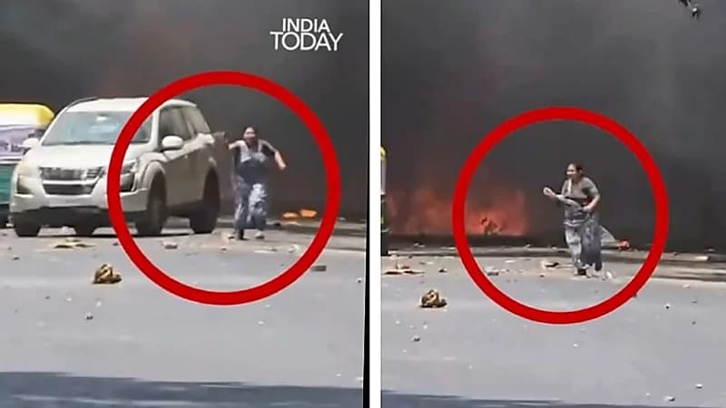 أم هندية تفشل في إنقاذ طفلها من نيران الطائرة المنكوبة .. فيديو